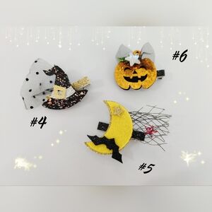 A Set of 3 Pieces Handmade Halloween pumpkin/witch hat/bat moon hair clips.